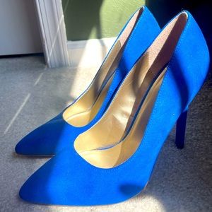 Beautiful high heel in royal blue color. Worn only once. Size US 6.5, EUR 37